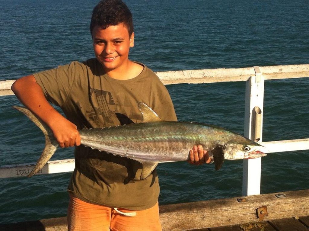 Hervey Bay's Myles Nautu was stoked to hook his first mackerel off the Urangan Pier this week. Hervey Bay's Myles Nautu was stoked to hook his first mackerel off the Urangan Pier this week.